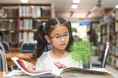 girl with glasses reading